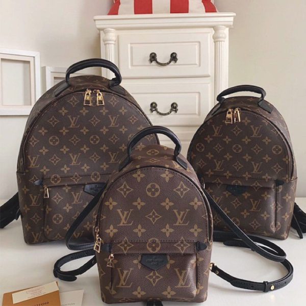Louis Vuitton handbag... - Brown Button Estate Sales | Facebook