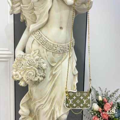 Alternative view of Replica Louis Vuitton Monogram Empreinte Leather Mini Pochette Accessoires M81284