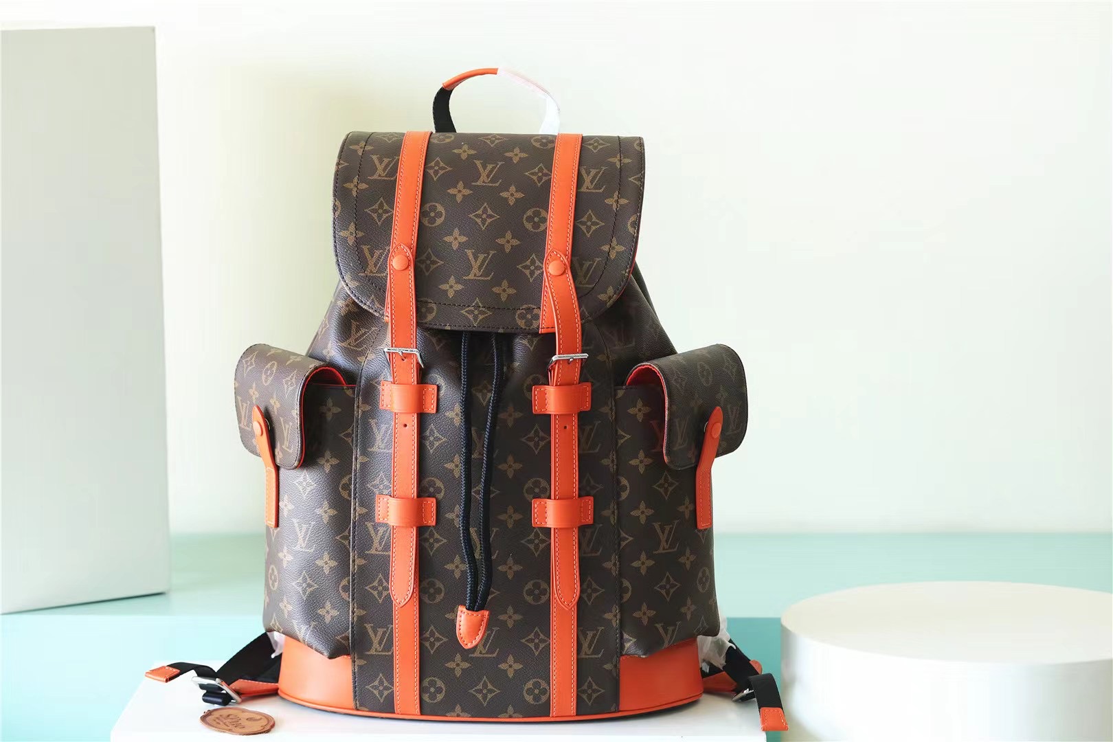Replica Louis Vuitton Christopher MM Monogram backpack for mens Orange M46814