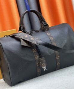 Alternative view of Louis Vuitton Taiga Leather Keepall Bandouliere 45 In Black And Monogram Macassar Canvas