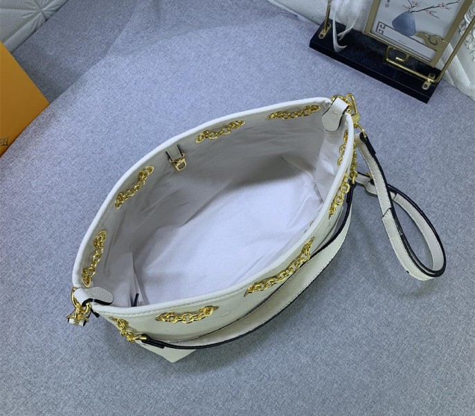 Louis Vuitton Monogram Empreinte Leather Bundle Bag In Cream - Image 6