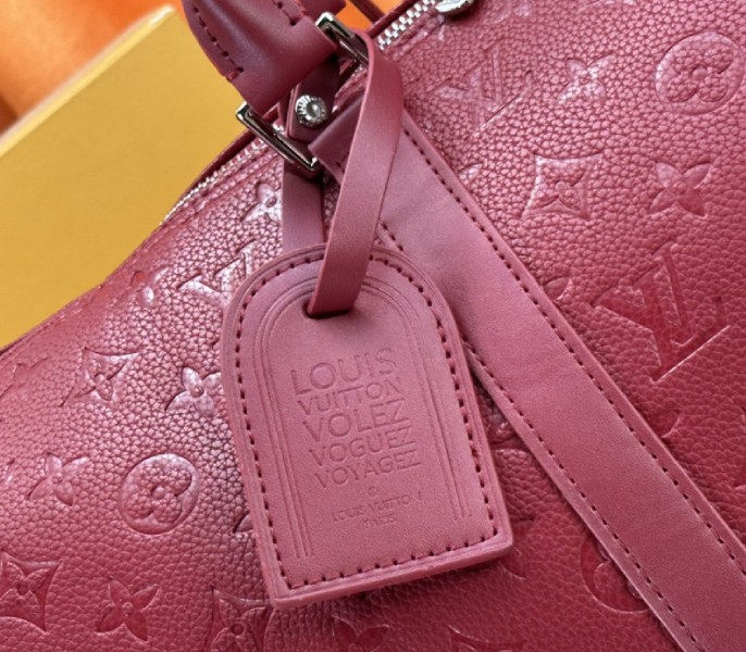 Louis Vuitton Taurillon Leather Keepall Bandouliere 50 In Sari Red - Image 9