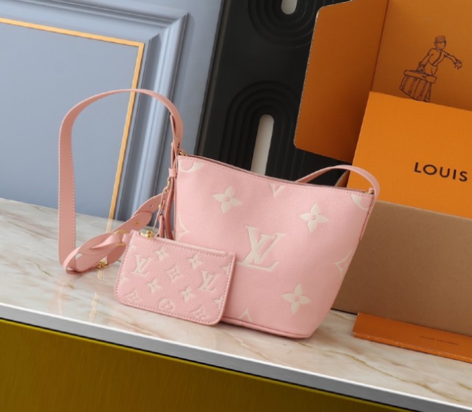 Its a Monogram Empreinte Louis Vuitton All In BB Bag M12925