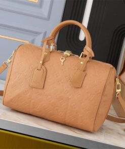 Louis Vuitton Monogram Empreinte Speedy Soft 30 Handbag In Arizona Beige