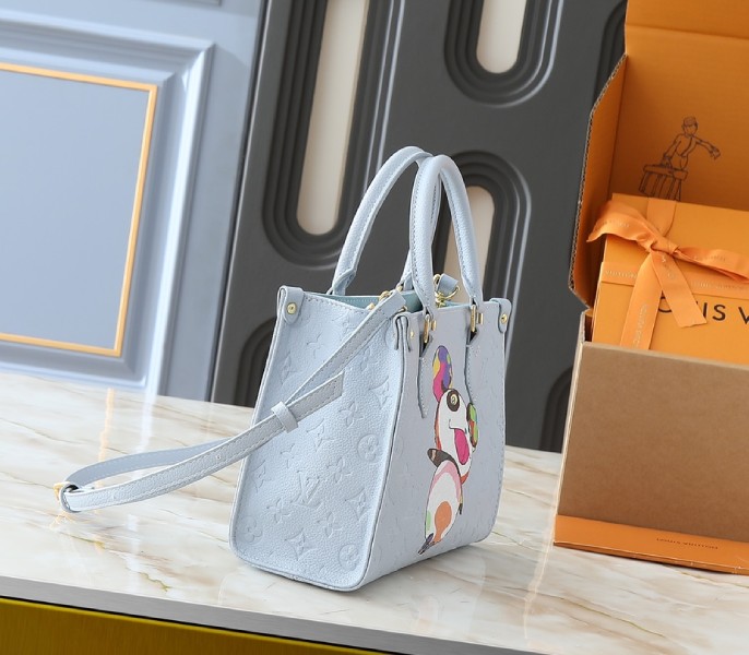 X TM Monogram Empreinte OnTheGo PM With Bijou Edition In Washed Blue - Image 2