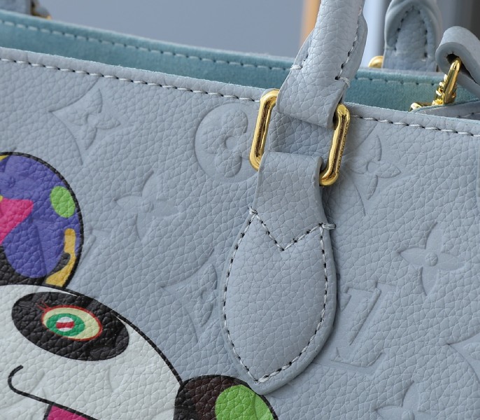 X TM Monogram Empreinte OnTheGo PM With Bijou Edition In Washed Blue - Image 8